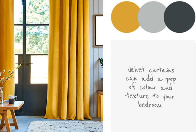 Room with large windows with yellow velvet curtains